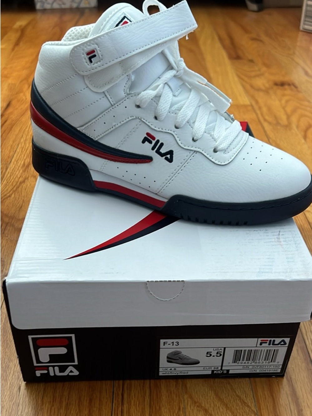 Fila White High-Top Sneakers with Navy & Red Accents